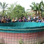 Foto bersama saat kegiatan pelatihan budidaya ikan nila di Desa Sekuningan Baru, Kecamatan Balai Riam, Kabupaten Sukamara (Foto : Ist)