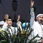 BERSHALAWAT : Gubernur Kalimantan Tengah, Sugianto Sabran  bersama Wakil Gubernur Kalteng, Edy Pratowo menghadiri Kalteng Bershalawat yang digelar di Stadion Panunjung Tarung, Kuala Kapuas, Kamis (12/9/2024) malam. (foto:mmc)